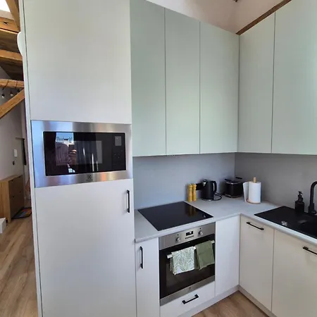 Lägenhet Between The Roofs Of Jezyce Poznań