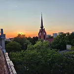 Between The Roofs Of Jezyce *