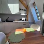 Between The Roofs Of Jezyce *