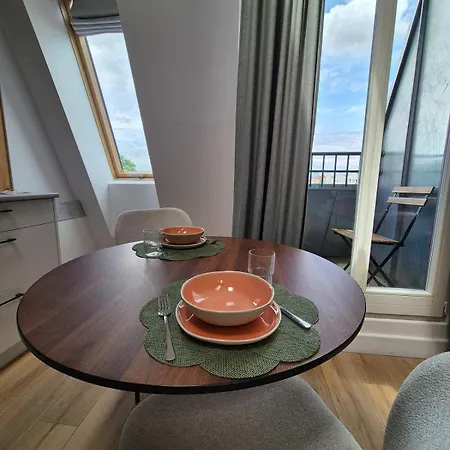 Between The Roofs Of Jezyce Apartment